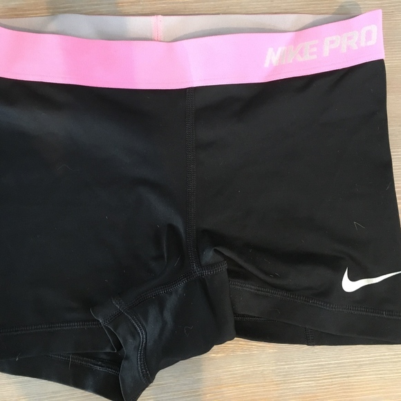 black nike pro shorts with pink band